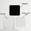 A set of black acrylic fridge magnets with double-sided tape and a magnet for personalization