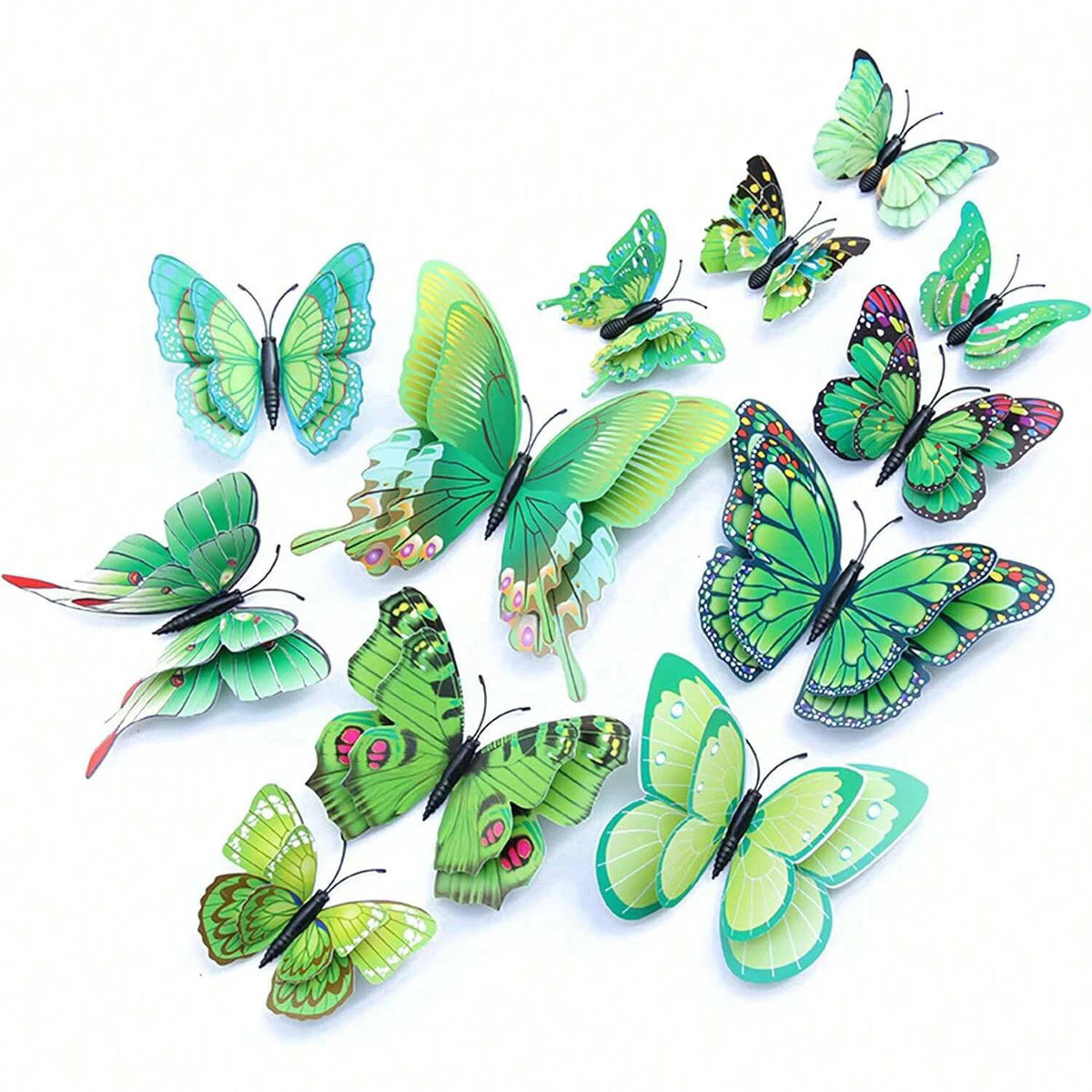 A set of twelve vibrant green and blue magnetic butterfly wall decor pieces.