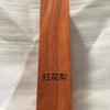 A rectangular block of reddish-brown wood, likely a blank for knife handles or DIY projects.