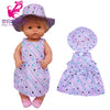 A 40cm doll outfit set featuring a purple and white striped dress and matching hat.