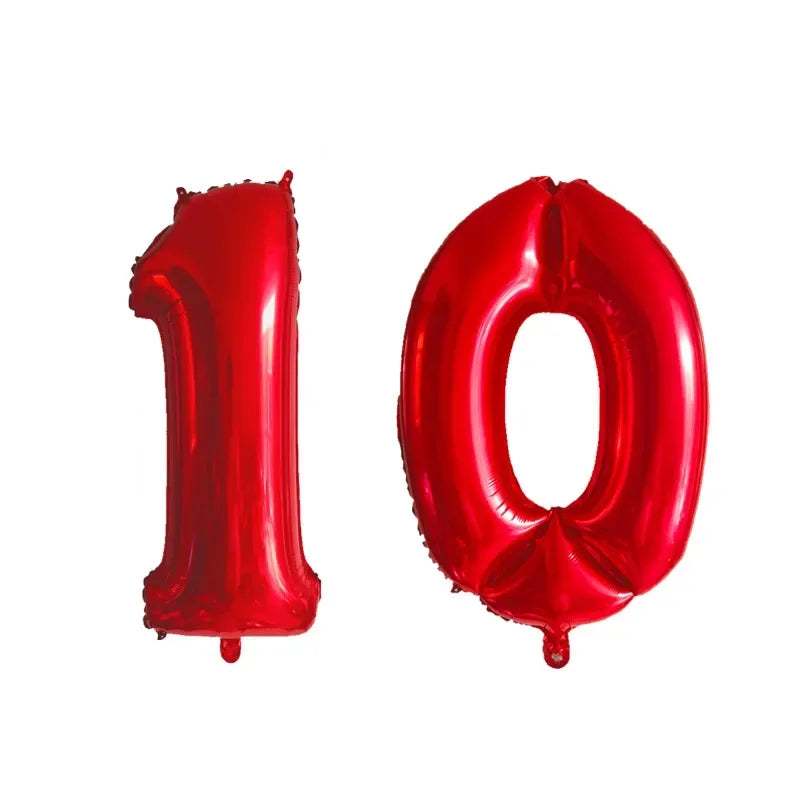 A pair of red helium foil number balloons spelling out 10.