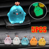 Five colorful luminous resin chicken car ornaments displayed on a black surface with a magnified view of one
