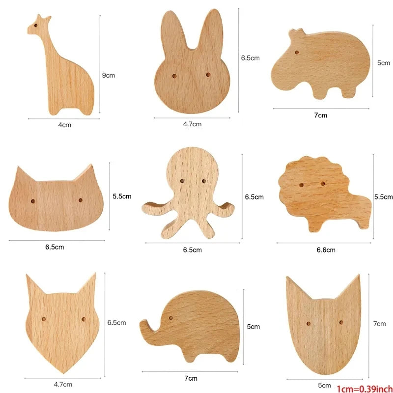 A collection of decorative wooden animal hooks including a giraffe, rabbit, cat, elephant, and fox.