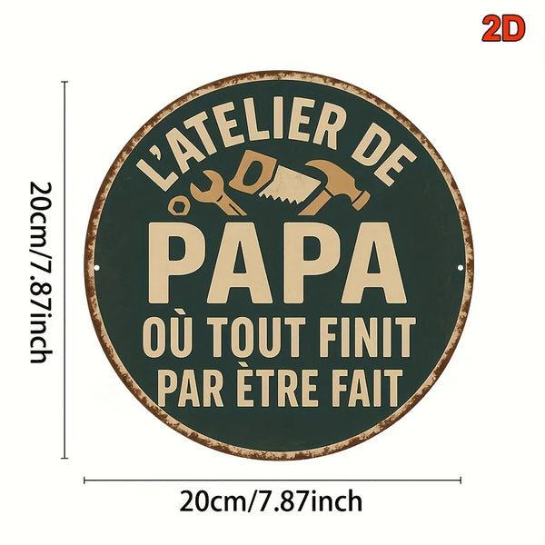 Vintage metal sign for Papa's workshop reading L'Atelier de Papa où tout finit par être fait
