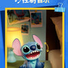 Stitch character mascot sitting on a green surface in a brightly lit room.