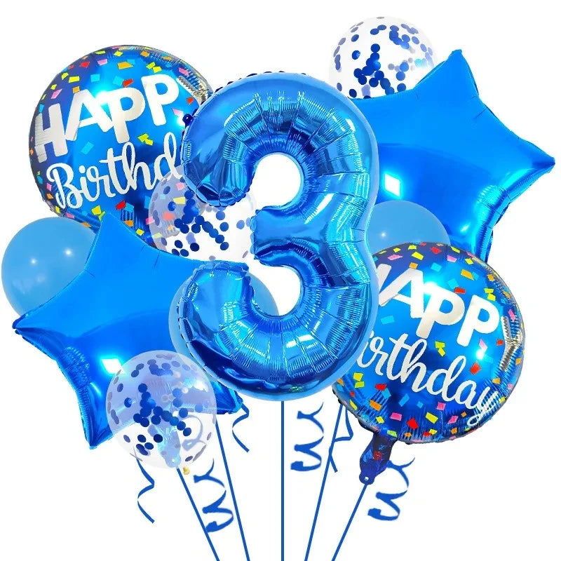 A set of navy and gold foil balloons shaped like the number 3 and a star for a birthday celebration