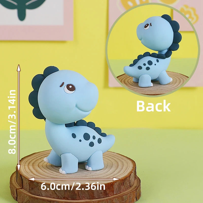 Set de topper de pastel de dinosaurio azul claro con una figura de dinosaurio de pie y una vista circular de la parte trasera