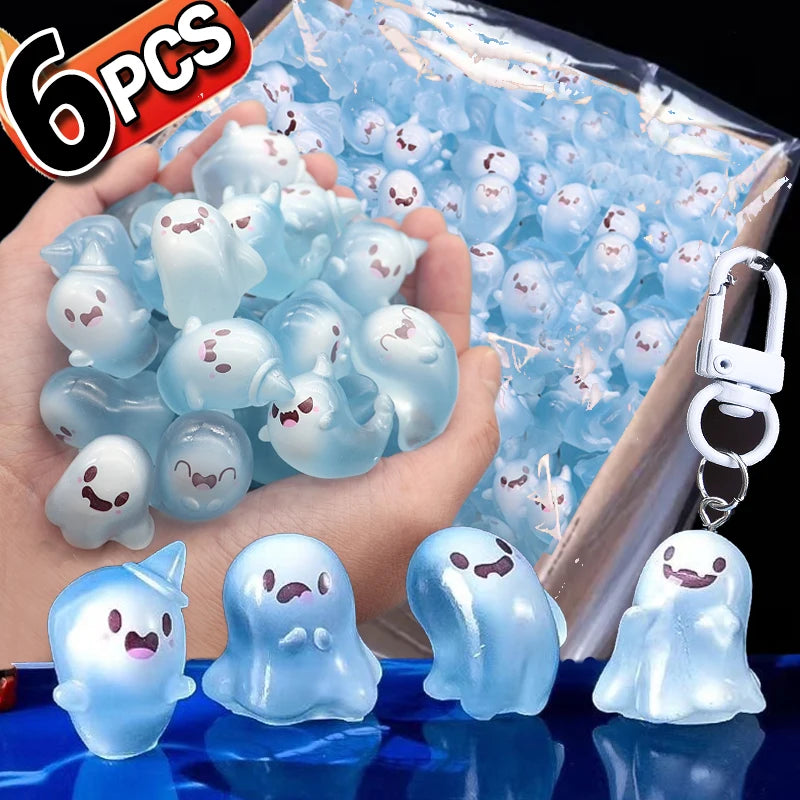 Six translucent blue ghost keychains are displayed in a hand against a background of more ghosts.