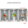 Trois arrangements floraux en pot présentés dans une boîte, montrant différentes tailles et dimensions.