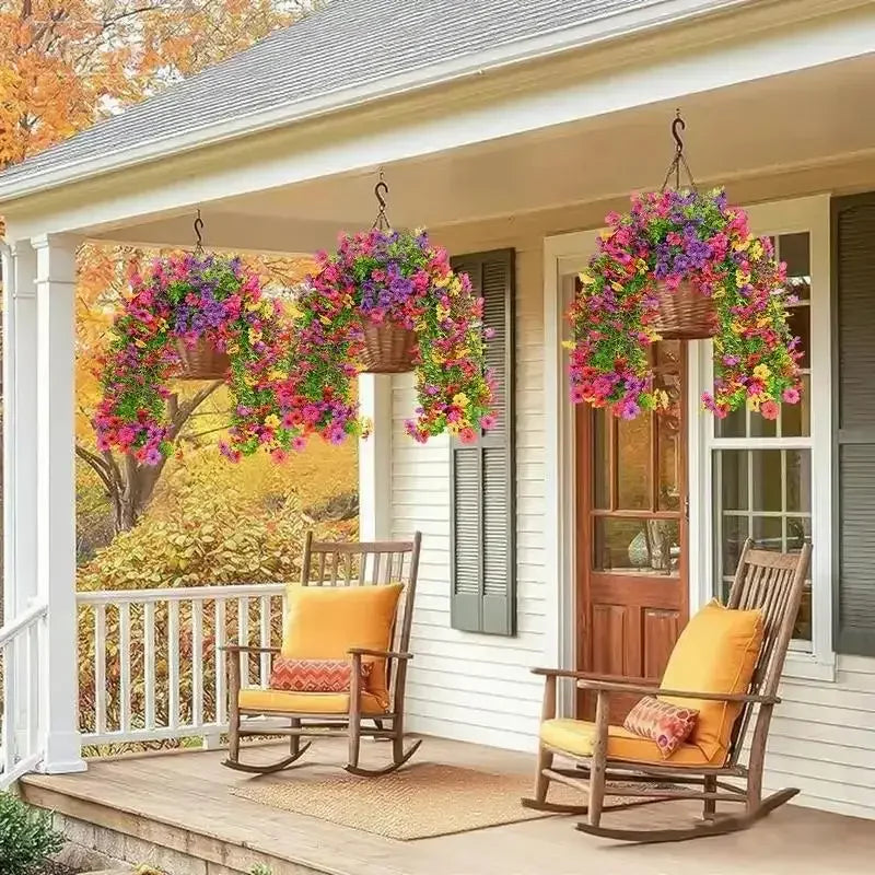 A porch decorated with hanging artificial flower vines in shades of purple and pink.