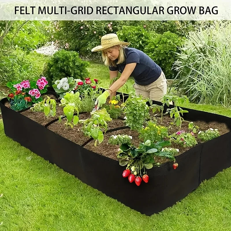 A woman is tending to a rectangular raised garden bed filled with various plants in a black felt multi-grid grow bag.