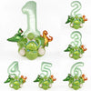 A set of avocado green dinosaur-themed balloons shaped like the numbers one through six for birthday decorations