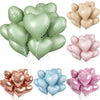A collection of heart-shaped foil balloons in various shades of green, pink, and gold.