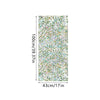 Botanical print static cling window film featuring green leaves and floral elements.