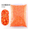 Bag of orange A65 resin rhinestones for crafting