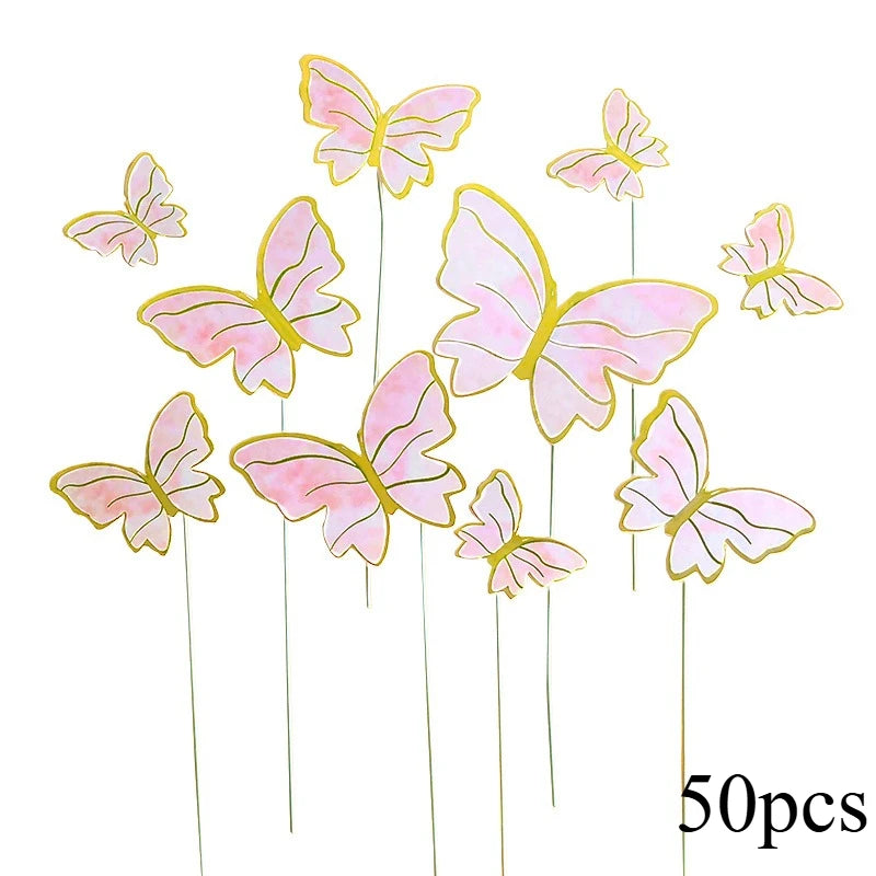 50 paper butterfly cake toppers in shades of pink and yellow