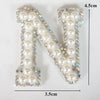 A white pearl alphabet letter N rhinestone patch measuring 4.5cm high and 3.5cm wide.