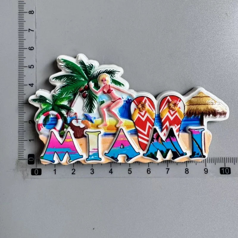 A colorful magnet featuring the word MIAMI with tropical leaves and palm fronds.