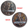 A commemorative coin showing the front and back designs of Archangel Michael, featuring biblical scripture and victory imager