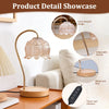 A brass and wood decorative lamp with a lotus-shaped design, featuring an adjustable neck and a timer/dimmer control.