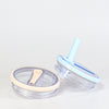 A clear blue replacement lid for a tumbler, shown next to the cup it fits onto.