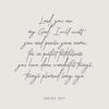 A black script rendering of Isaiah 25:1 on a light beige background.