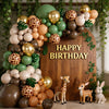 A balloon garland featuring safari jungle prints, including elephants and giraffes, displayed on a wooden backdrop.