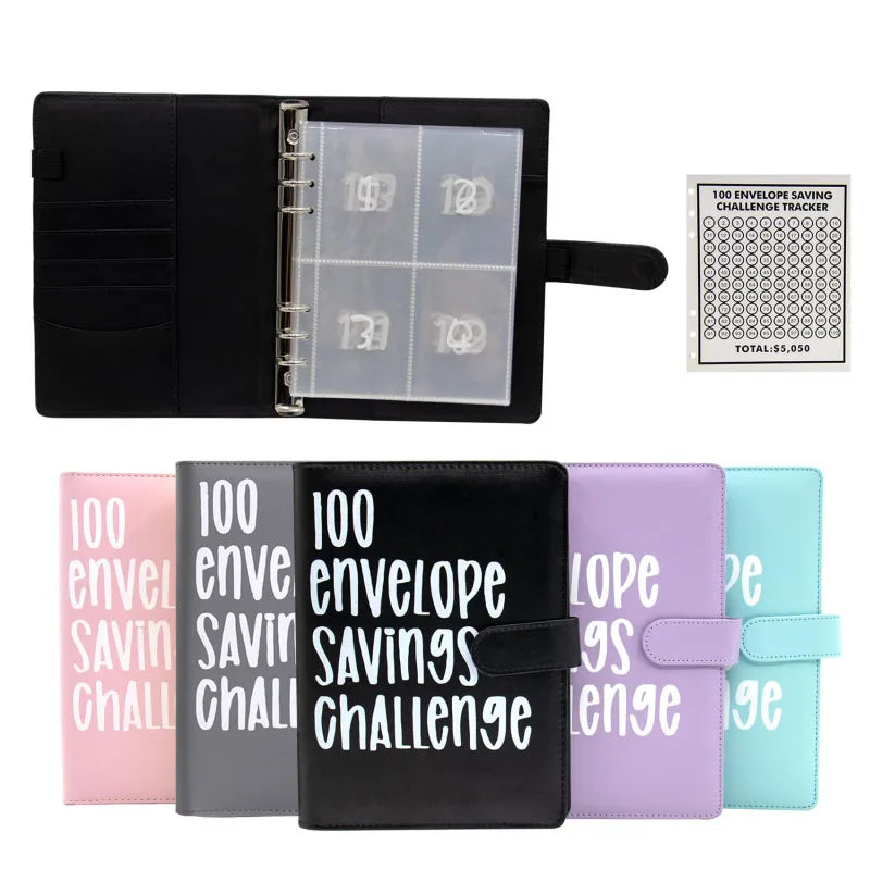 A black budget savings binder with clear envelopes and a separate tracker sheet.