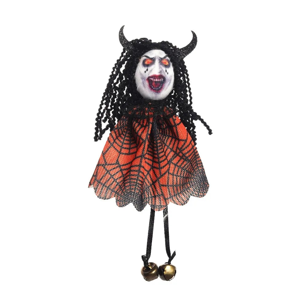A Halloween ornament featuring a scarecrow witch with black hair, white face paint, and an orange spiderweb dress.