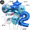 A collection of blue shark foil balloons in various sizes and shapes for an ocean-themed party decoration.