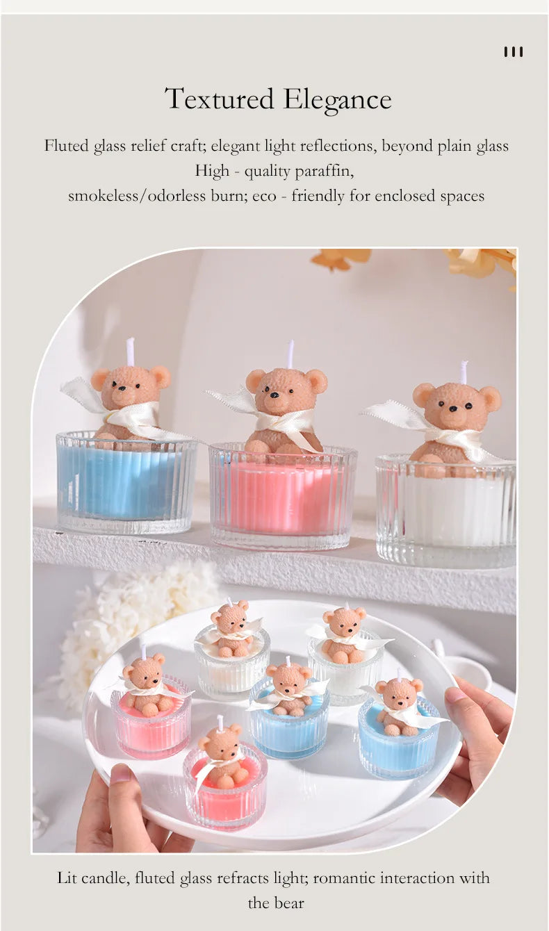 Fluted glass relief soy wax teddy bear candles in various colors displayed on a white plate