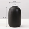 A matte black ceramic vase with a rounded body and a narrow opening, shown against a white background.