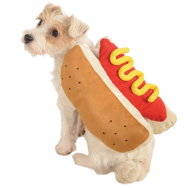 A dog wearing a costume shaped like a hot dog with a bun and sausage.