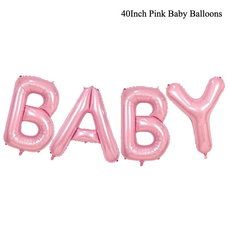 Pink baby balloons shaped like the word BABY with a bowknot garland