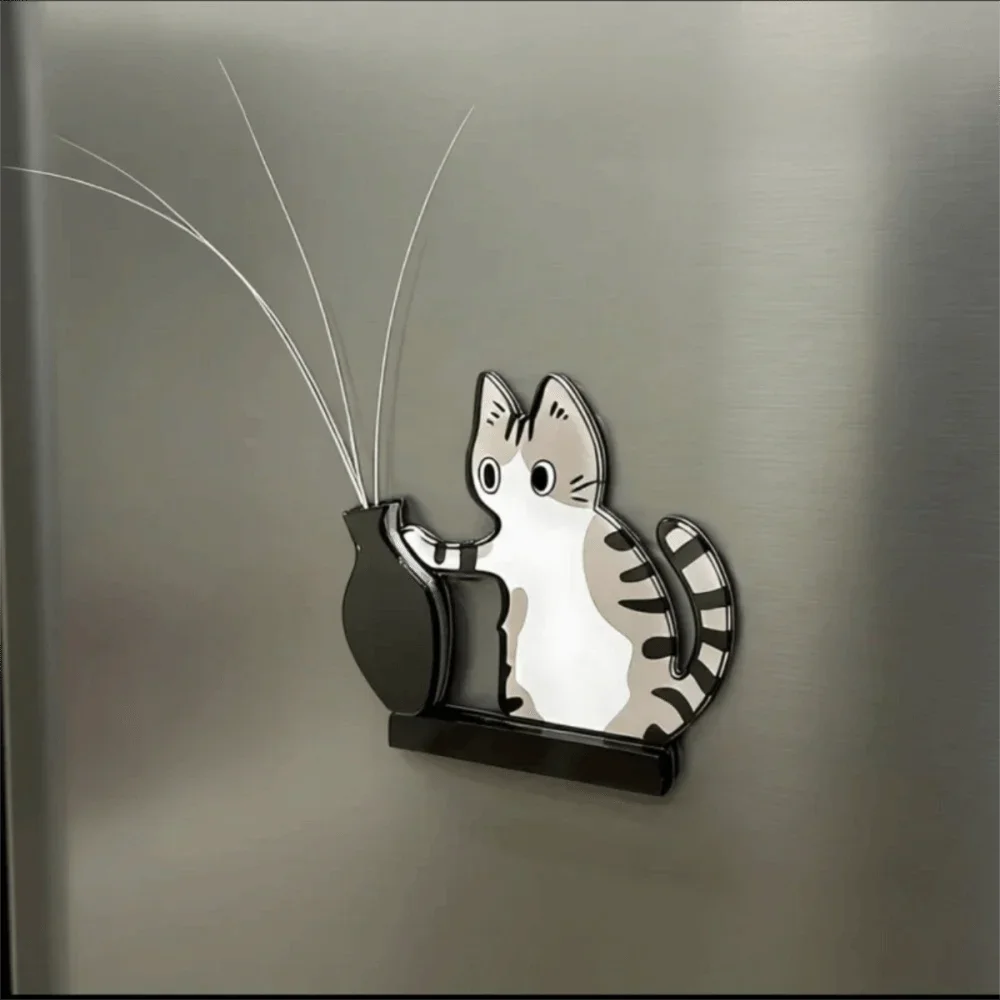 A magnetic acrylic decor featuring a cat head with long whiskers against a brushed metal background.