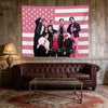 A pink American flag tapestry featuring several Kpop idols posing against the flag backdrop.