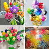 A collection of colorful magic twisting balloons in various shades including pink, purple, yellow, and green.
