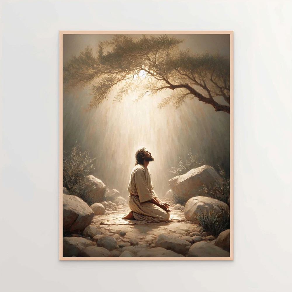 A painting depicting a silhouette of Jesus looking up towards a bright light shining through tree branches and rocks.
