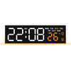 Digital alarm clock displaying 22:08 and 26 degrees with day of the week indicators.