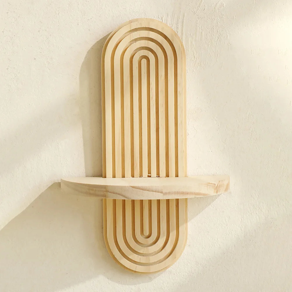 A wooden arc wall shelf set featuring a rustic floating design with concentric vertical lines mounted on a white wall.