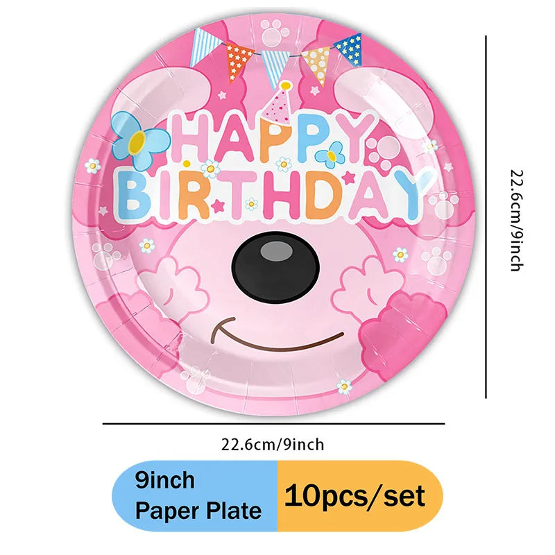 A pink paper plate with a happy birthday design featuring colorful bunting and flowers.