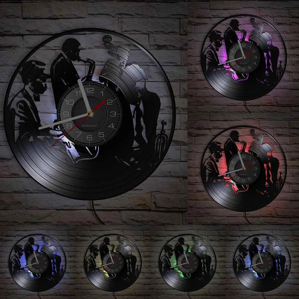 A collection of vintage vinyl record wall clocks showing various silhouettes and a clock face.