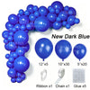 A collection of dark blue latex balloons, ribbon, chain, and glue for party decor.