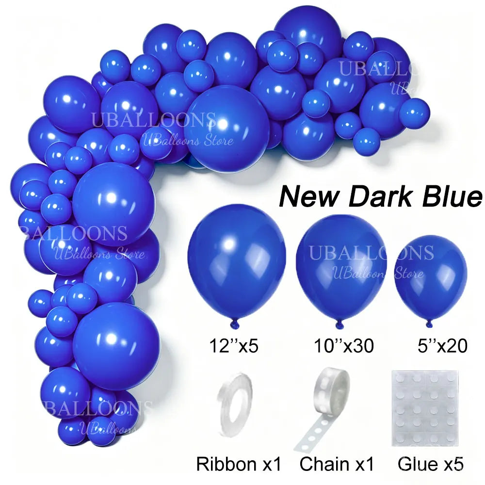 A collection of dark blue latex balloons, ribbon, chain, and glue for party decor.