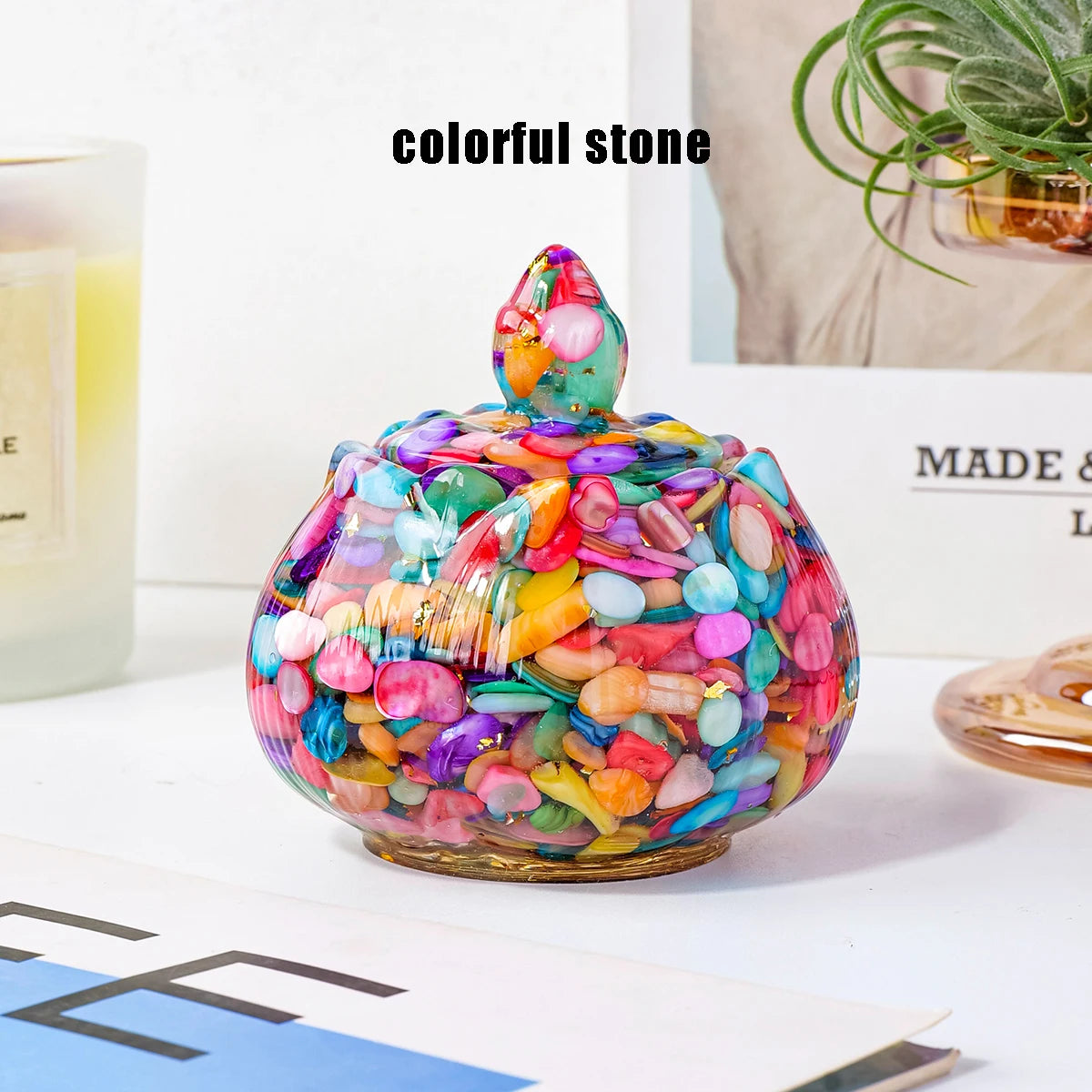 Colorful stone crystal bowl with iridescent and vibrant stones used for meditation and home decor