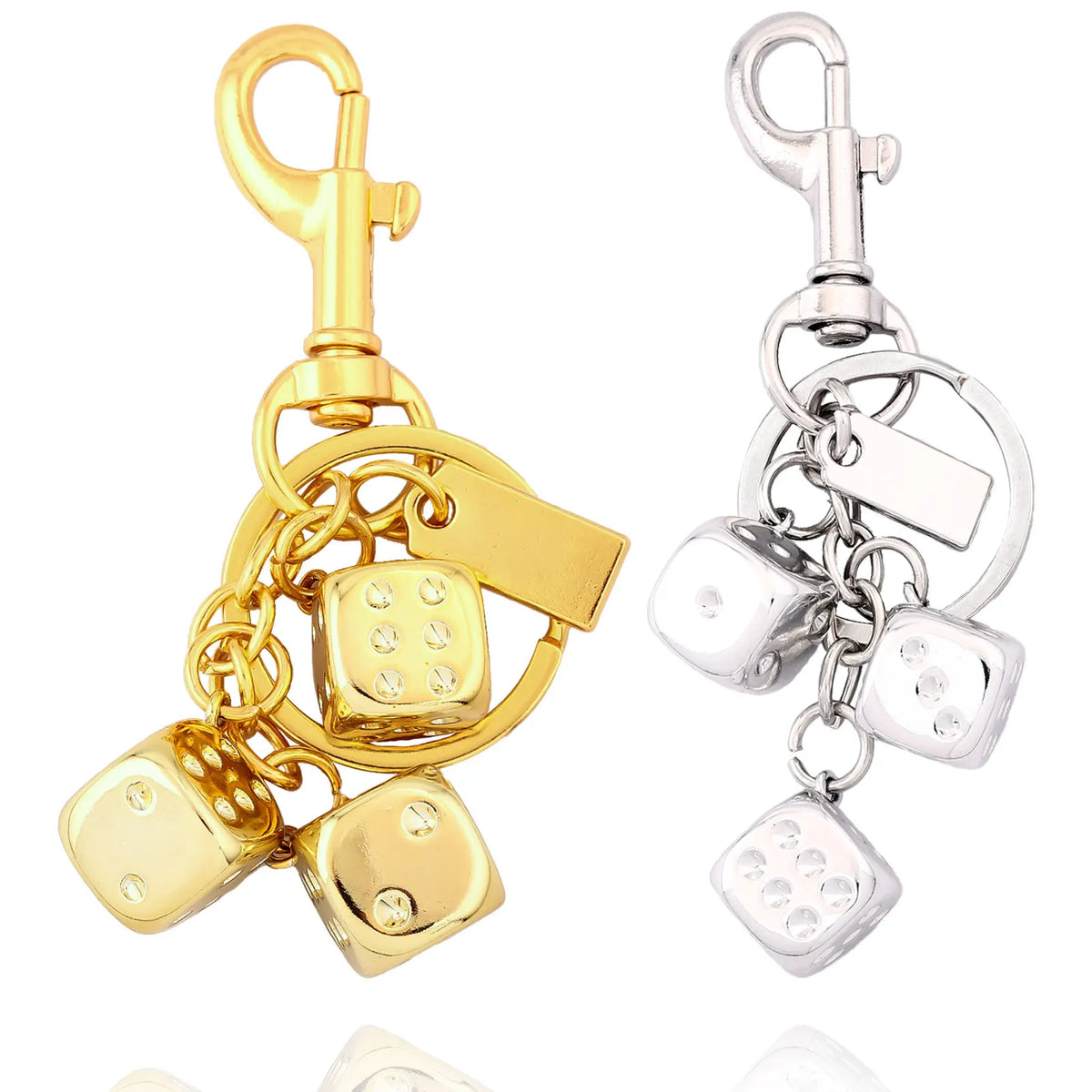 Golden dice keychain with a lucky charm design featuring gold-colored dice and silver charms.