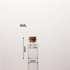 A clear glass bottle with a cork stopper is shown next to a measurement scale indicating 8ML capacity.