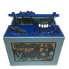 A resin piggy bank shaped like Godzilla, featuring a blue body and an open top revealing a small figure.