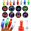 A hand holds a finger projector light with various spooky LED designs, including a pumpkin and skull.