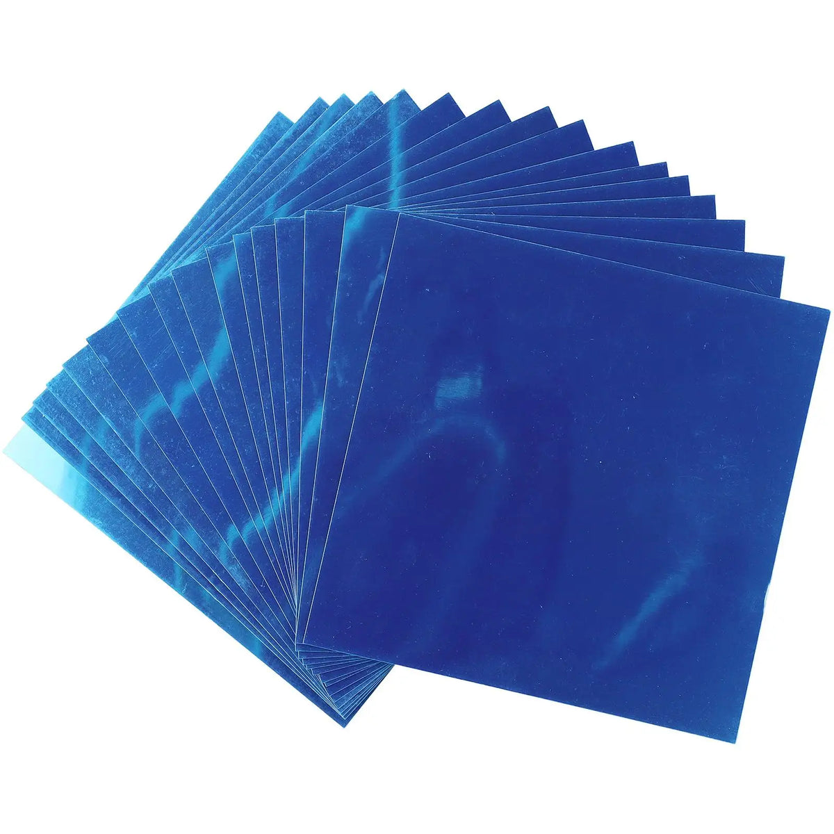 A stack of bright blue decorative acrylic mirror mosaic tiles viewed from an angle.